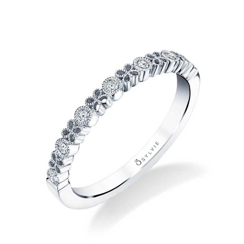 http://nfoxjewelers.bluestar-apps.com/upload/product/PLATINUM WEDDING BAND WITH .08CTTW ROUND SI2 CLARITY & HI COLOR DIAMONDS SET WITH A BEAD DESIGN FINGER SIZE 3.75