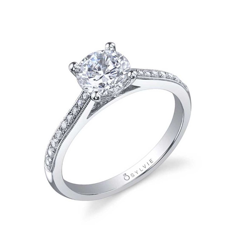 http://nfoxjewelers.bluestar-apps.com/upload/product/14K WHITE GOLD SEMI MOUNTING WITH .13TWT ROUND SI1 CLARITY & GH COLOR DIAMONDS PAVE SET DOWN THE MILGRAIN SHANK (SET WITH A ROUND CZ)